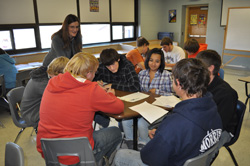 Gerri with students (Photo by Emily Wickstrom, Capital Journal)